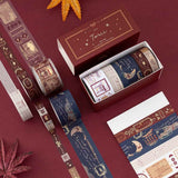 Flatlay of Tsuki Torii washi tape set by notebook therapy on red background