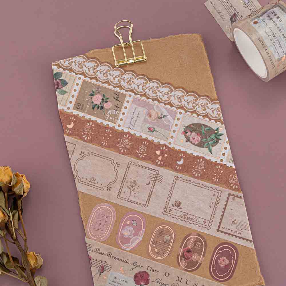 Tsuki ‘Vintage Rose’ Washi Tape Set on kraft paper clipboard with dried flowers on mauve background