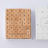 Tsuki Bullet Journal Typewriter Style Alphabet Stamps with eco-friendly gift box packaging on light grey background