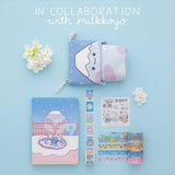 Tsuki ‘Four Seasons’ Fuji Pop-Up Pencil Case by Notebook Therapy x Milkkoyo with Tsuki ‘Four Seasons: Winter Edition’ Bullet Journal and Tsuki ‘Four Seasons’ Washi Tapes with free stickers sheets with white flowers on light blue background