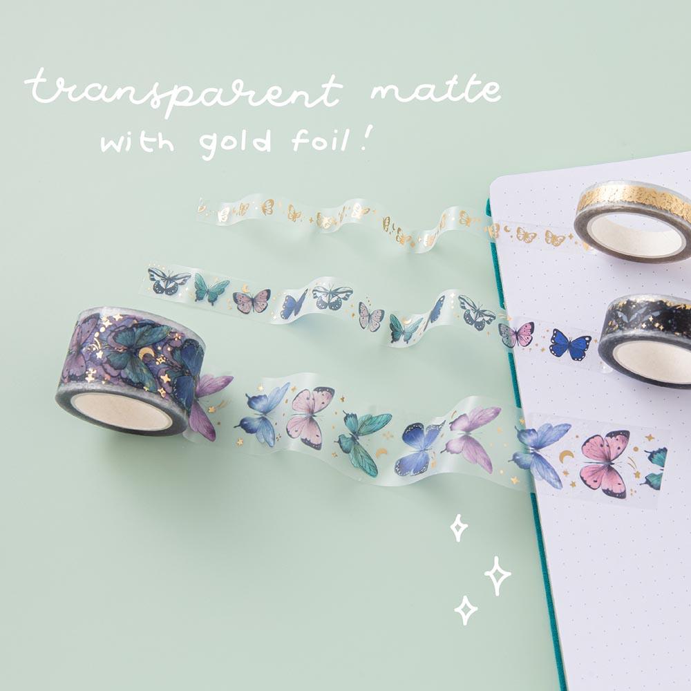Close up of Tsuki ‘Flutter + Dream’ Washi Tapes by Notebook Therapy x Pelinkan in transparent matte with gold foil on open bullet journal page on mint background