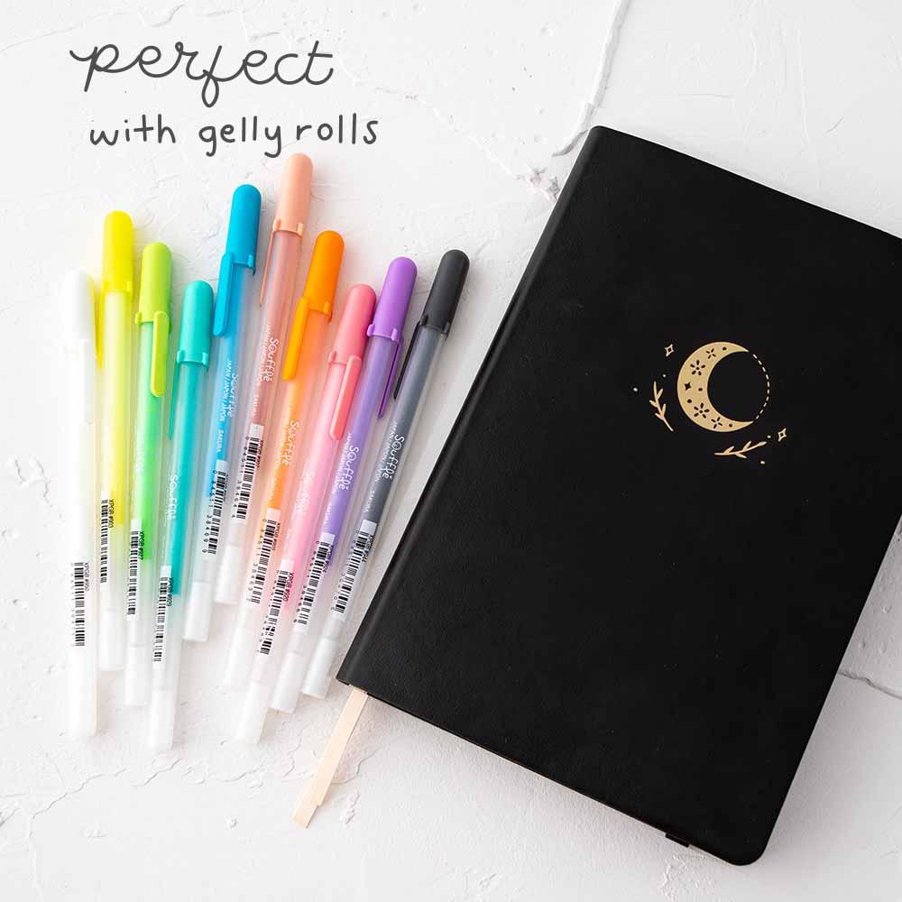 Tsuki Black Paper Limited Edition Hardcover Bullet Journal in Moonflower with Gelly Roll Pens on white background