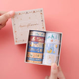 Tsuki ‘Moonflower’ Washi Tape Set with luxury eco-friendly box packaging held in hands in coral pink background