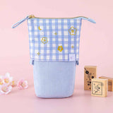 Tsuki ‘Sakura Journey’ Pop-Up Pencil Case with Tsuki ‘Sakura Journey’ Bullet Journal Stamps with cherry blossoms in light pink background