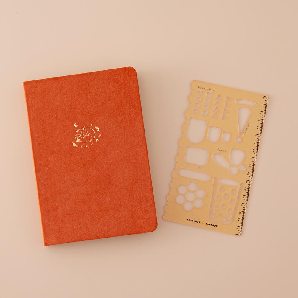 Tsuki Bullet Journal Stencil Set in neutral with Tsuki ‘Kitsune’ Limited Edition Fox Bullet Journal on beige background