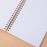 Tsuki honey peach floral ringbound notebook close up on paper in peach background